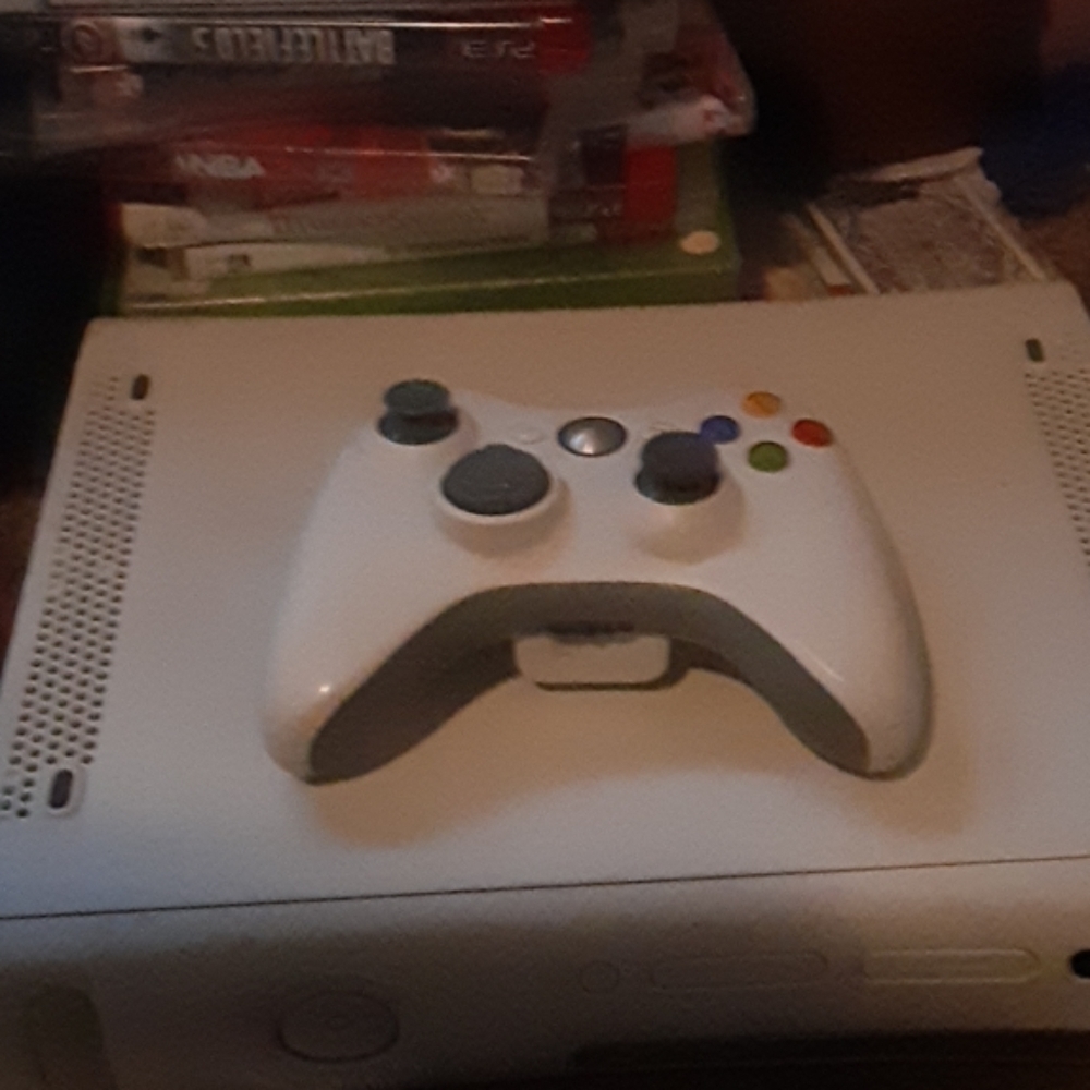 Xbox 360 with control and games